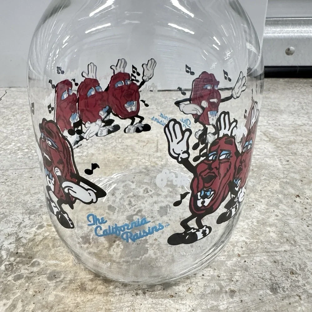 1989 Lot California Raisins Glass Carafe w Lid + 2 Christmas PVC Figures Vintage